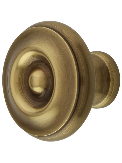 Waverly Cabinet Knob - 1 3/4 inch Diameter in Antique Brass.